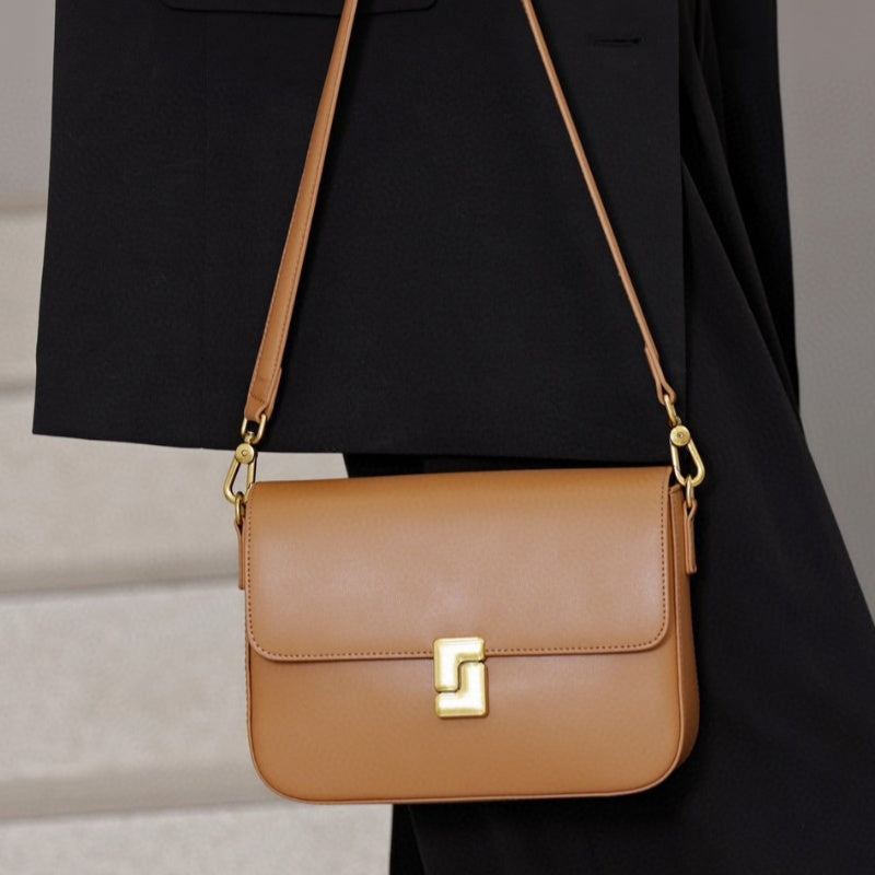 Chic Black Crossbody Bag with Golden-Tone Hardware - Versatile Shoulder Purse for Women, Minimalist Design, Zip Closure, Available in Sizes S to XXL