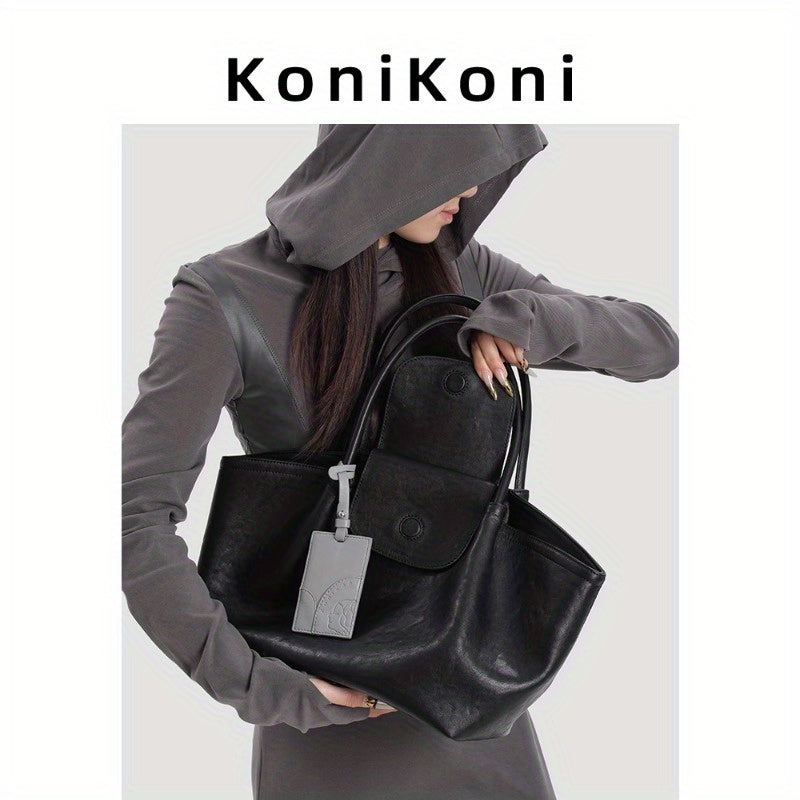 KoniKoni Genuine Leather Niche Black Large Capacity Tote Bag for Women, New Commuter Shoulder Handbag