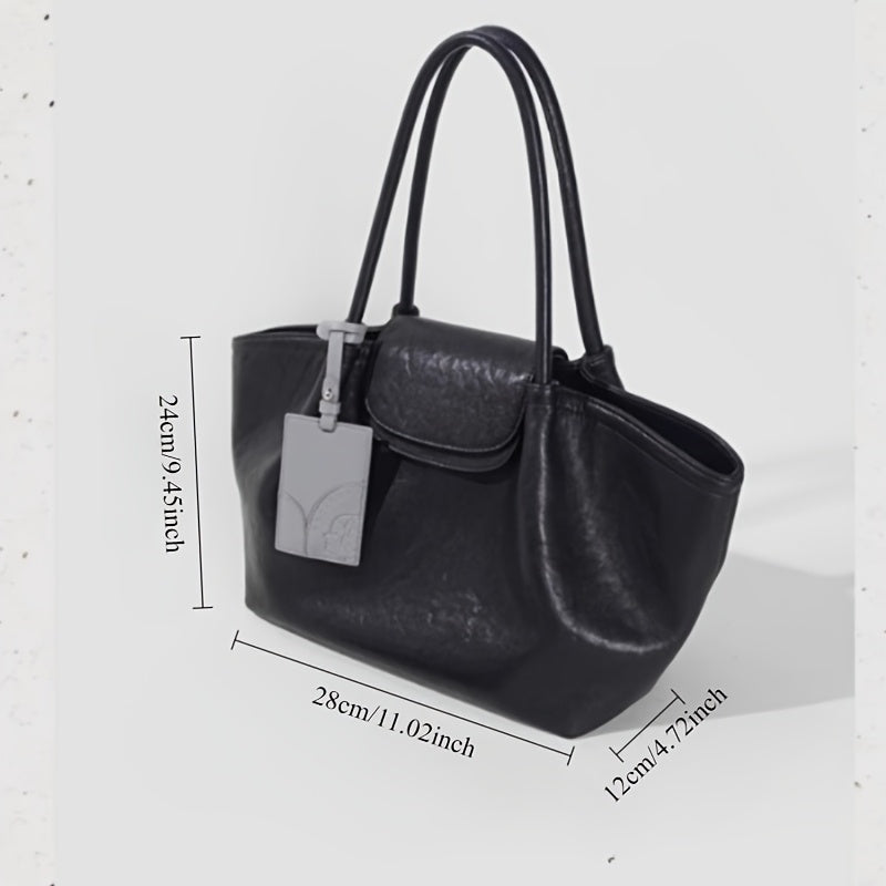 KoniKoni Genuine Leather Niche Black Large Capacity Tote Bag for Women, New Commuter Shoulder Handbag