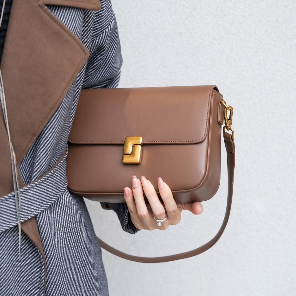 Chic Black Crossbody Bag with Golden-Tone Hardware - Versatile Shoulder Purse for Women, Minimalist Design, Zip Closure, Available in Sizes S to XXL