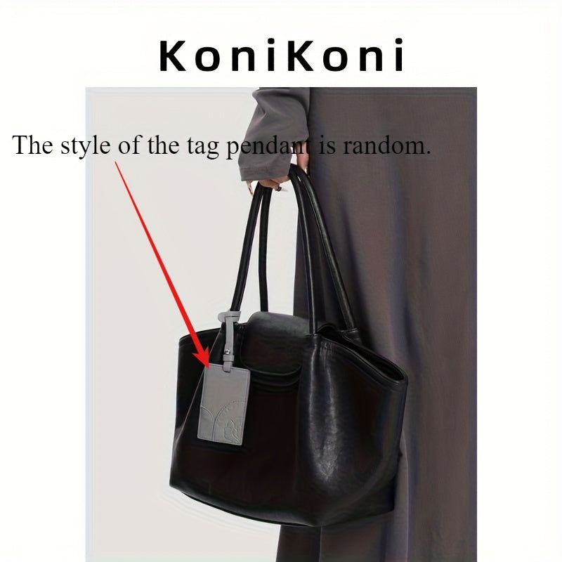 KoniKoni Genuine Leather Niche Black Large Capacity Tote Bag for Women, New Commuter Shoulder Handbag