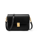 Chic Black Crossbody Bag with Golden-Tone Hardware - Versatile Shoulder Purse for Women, Minimalist Design, Zip Closure, Available in Sizes S to XXL