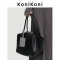 KoniKoni Genuine Leather Niche Black Large Capacity Tote Bag for Women, New Commuter Shoulder Handbag
